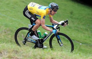 Bradley Wiggins kept his yellow jersey without incident.