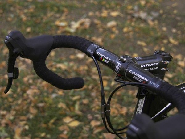 Carbon fibre cockpit components on a 'cross bike? They definitely save weight but try not to crash on them