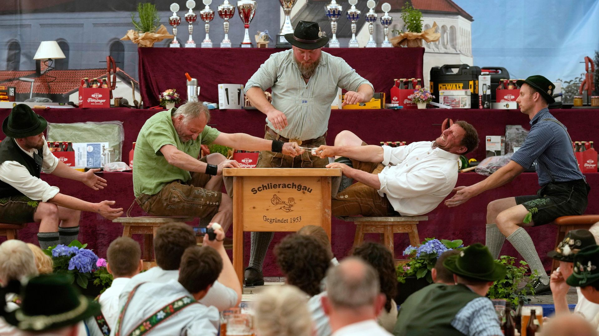 
                                Men compete during a finger wrestling championship in Pang, Germany 
                            