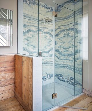 Shower with book-matched marble wall