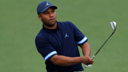 Harold Varner III plays a shot during a practice round before the 2022 Masters