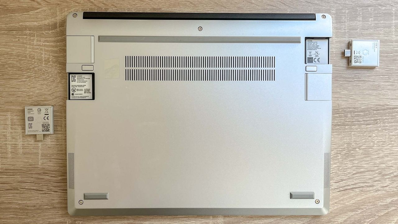 Framework Laptop 13 (2023) unit on desk with Expansion Cards showing