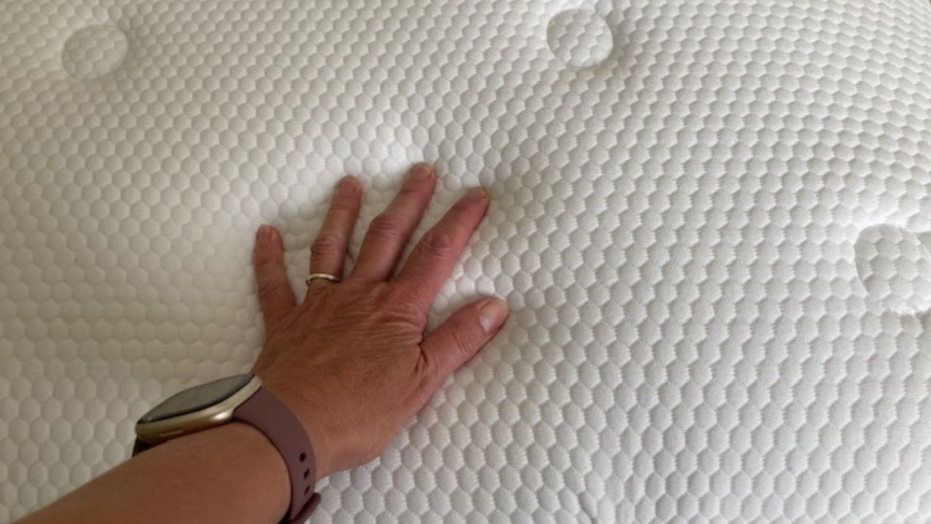 Evermore 1500 Pocket Spring Foam Hybrid Mattress in our tester, Linda's bedroom on a wooden bed frame