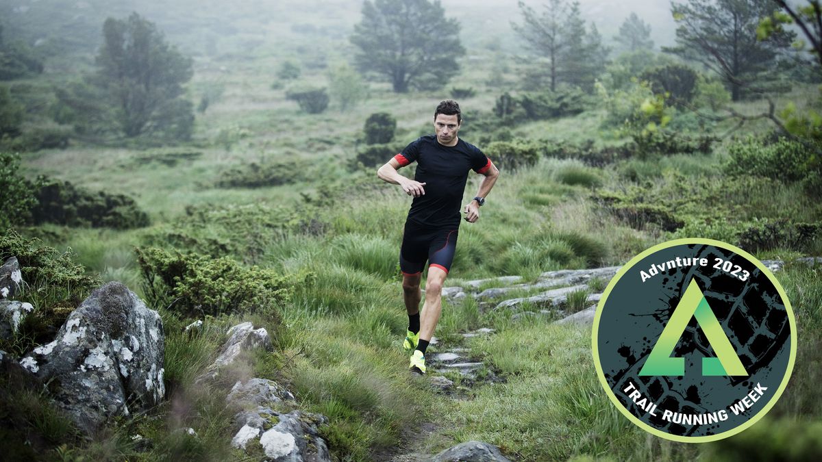 Man running through woodland alone