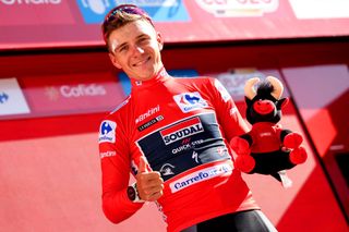 Vuelta a Espana 2023: Remco Evenepoel of Soudal-Quick Step celebrates on the podium of race leader after stage 4