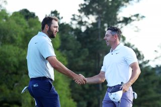 Rory McIlroy and Scottie Scheffler shake hands