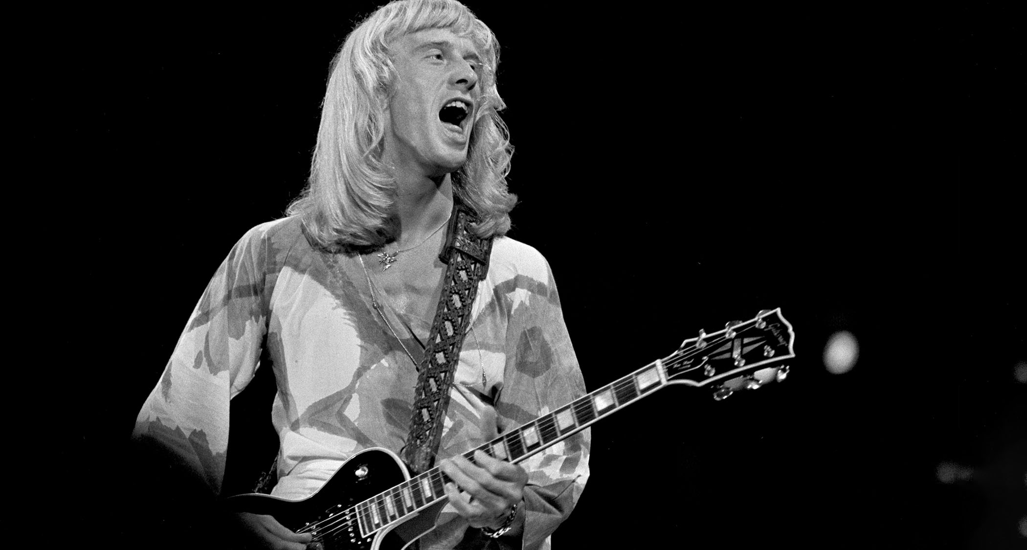 Davey Johnstone of the Elton John Band plays his Gibson Les Paul Custom onstage at a 1976 gig in Atlanta, GA.