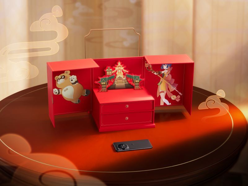 The inside of the collaboration box with OnePlus and Genshin Impact.