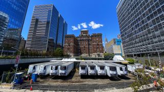 Trucks used as temporary morgues sit outside the New York City Chief Medical Examiner's office on May 12, 2020. 