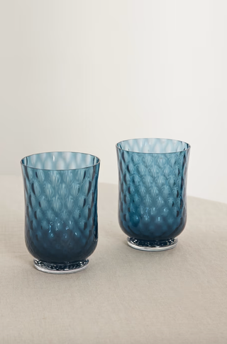 two blue textured drinking glasses