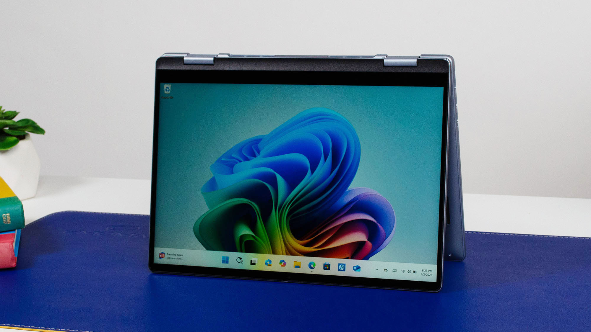 A Dell 14 Plus 2-in-1 in tent mode