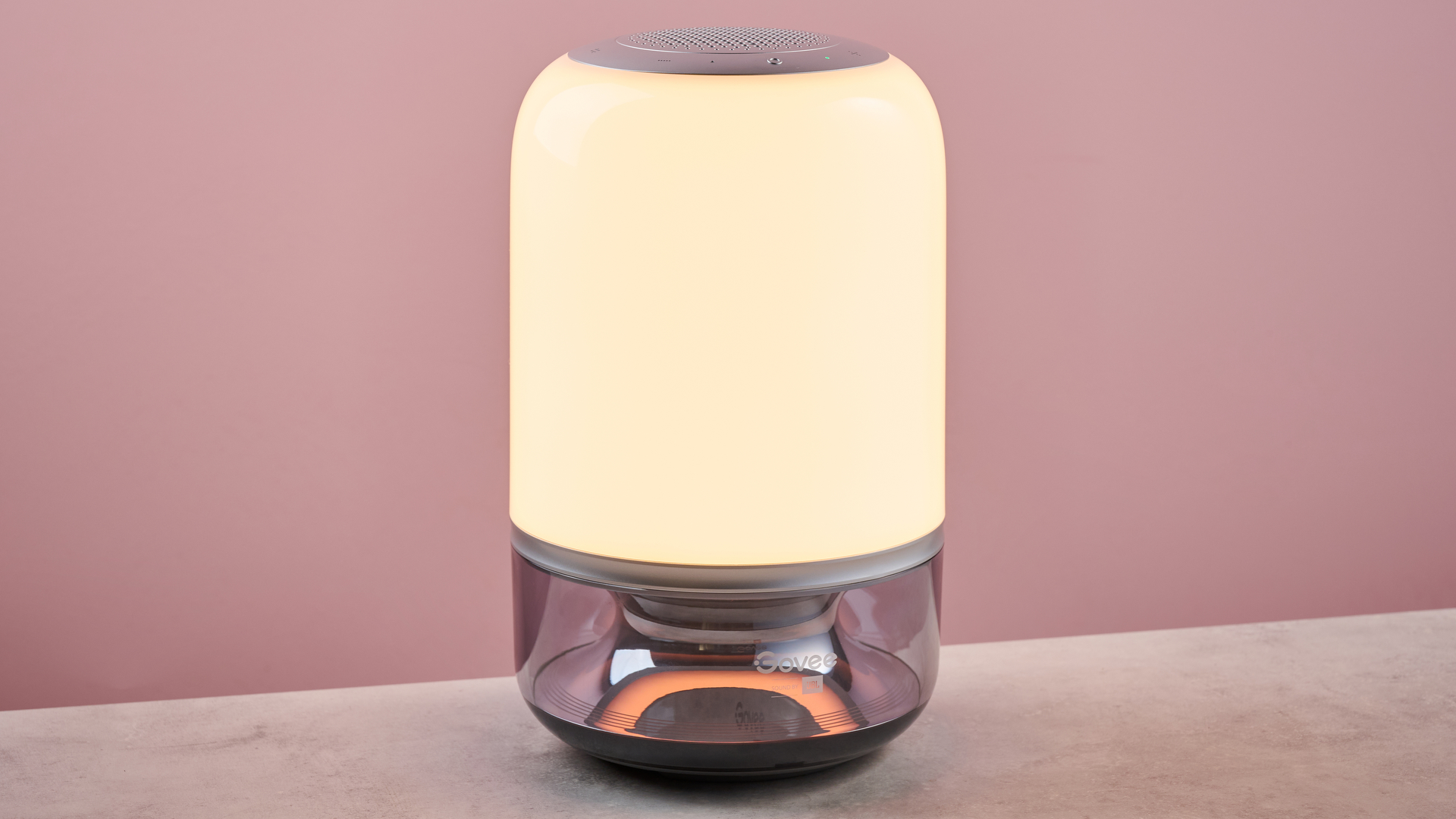 The Govee Table Lamp 2 Pro x Sound by JBL is emitting a warm white light.