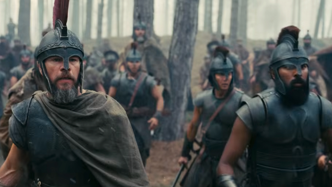 Matt Damon in battle gear in The Odyssey, alongside his fellow soldiers.