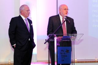 Dr. Robert Redfield Jr. (right) speaks during AIDS gala in 2013 in New York City.