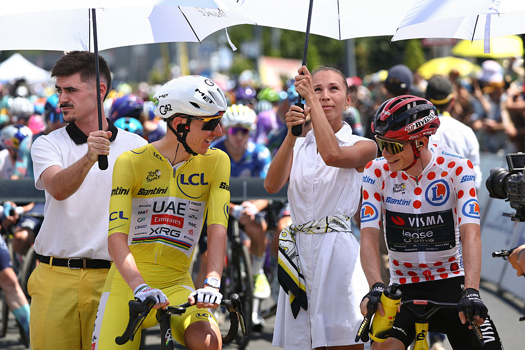 Tadej Poga&amp;#269;ar and Jonas Vingegaard laugh together at the start of a stage of the 2026 Tour de France
