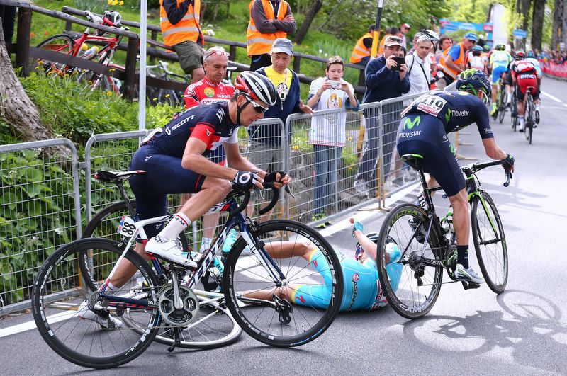 S&eacute;bastien Reichenbach (IAM Cycling) tries to avoid the fallen Diego Rosa (Astana)