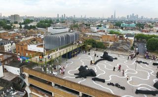 Aerial shot of the Observatory surrounded by the city