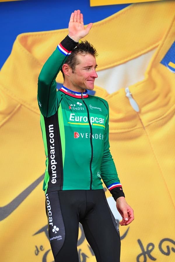 Thomas Voeckler (Europcar) steps onto the podium to a huge cheer from the crowd.
