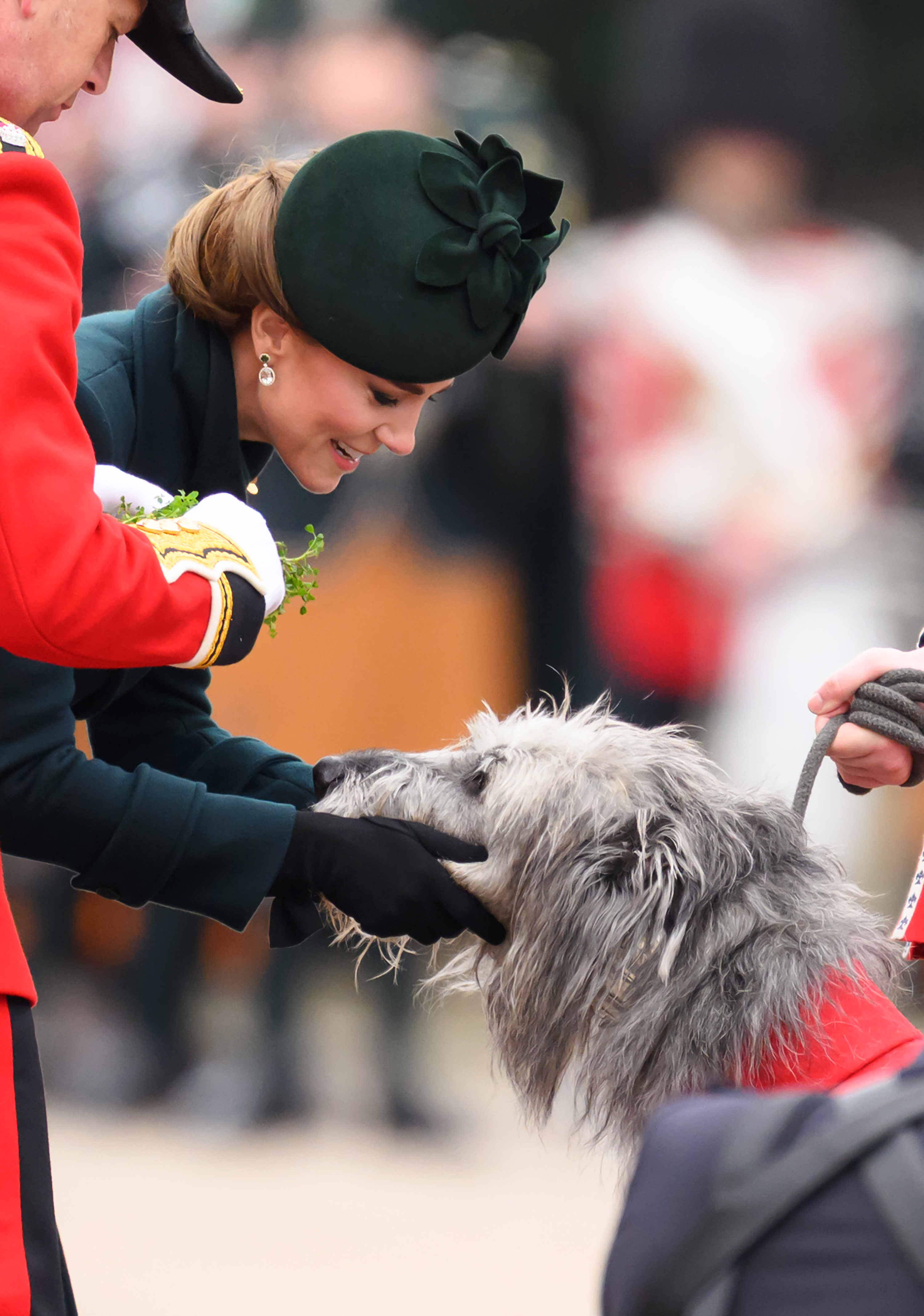 Kate Middleton petting a dog during the St. Patrick's Day 2025 parade