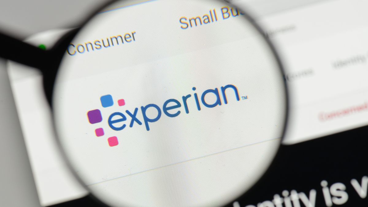 A magnifying glass held over the Experian logo as seen on the company&amp;#039;s website