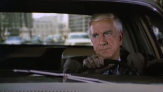 Leslie Nielsen driving a car in Police Squad!