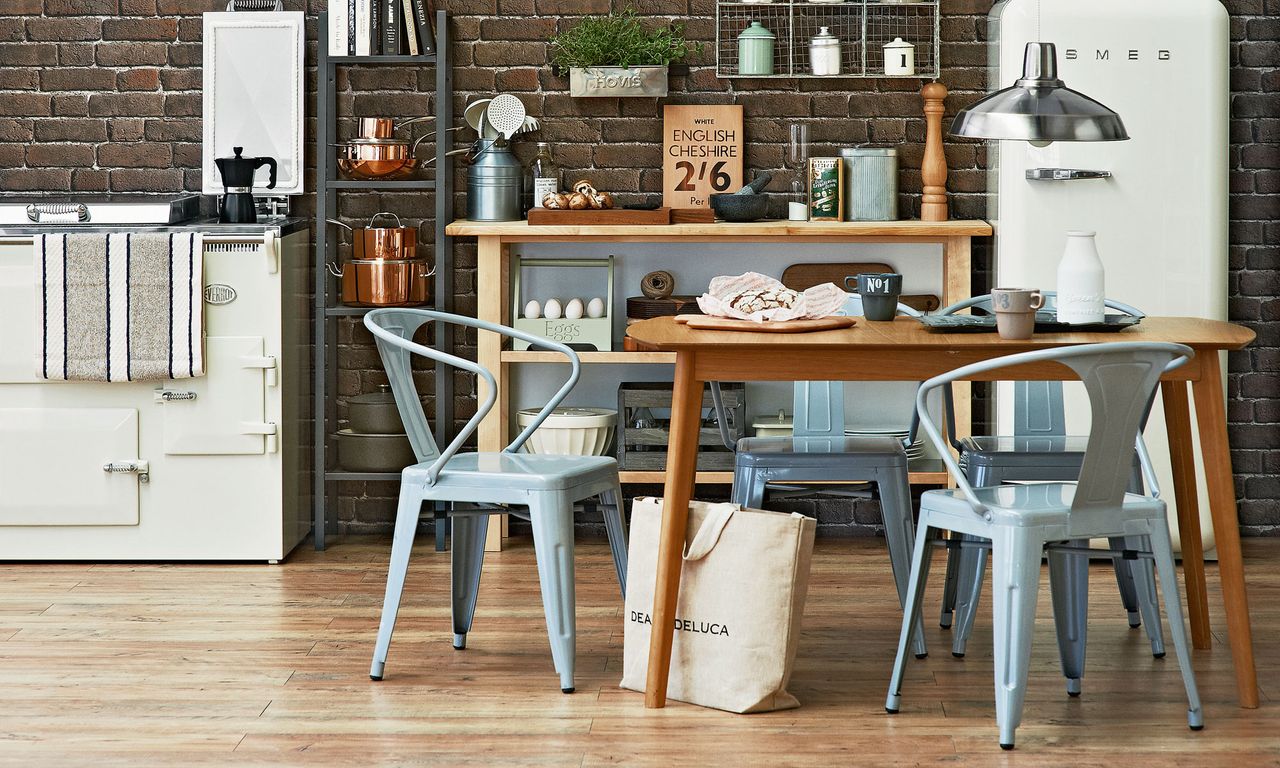 kitchen with wooden table and metal chairs