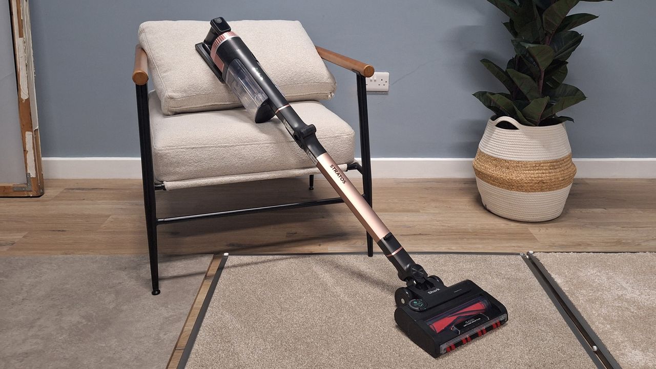 Shark Stratos IZ400 cordless vacuum in testing studio with floor samples