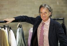 Designer Paul Smith is seen at the backstage prior to the Paul Smith Women Fashion show