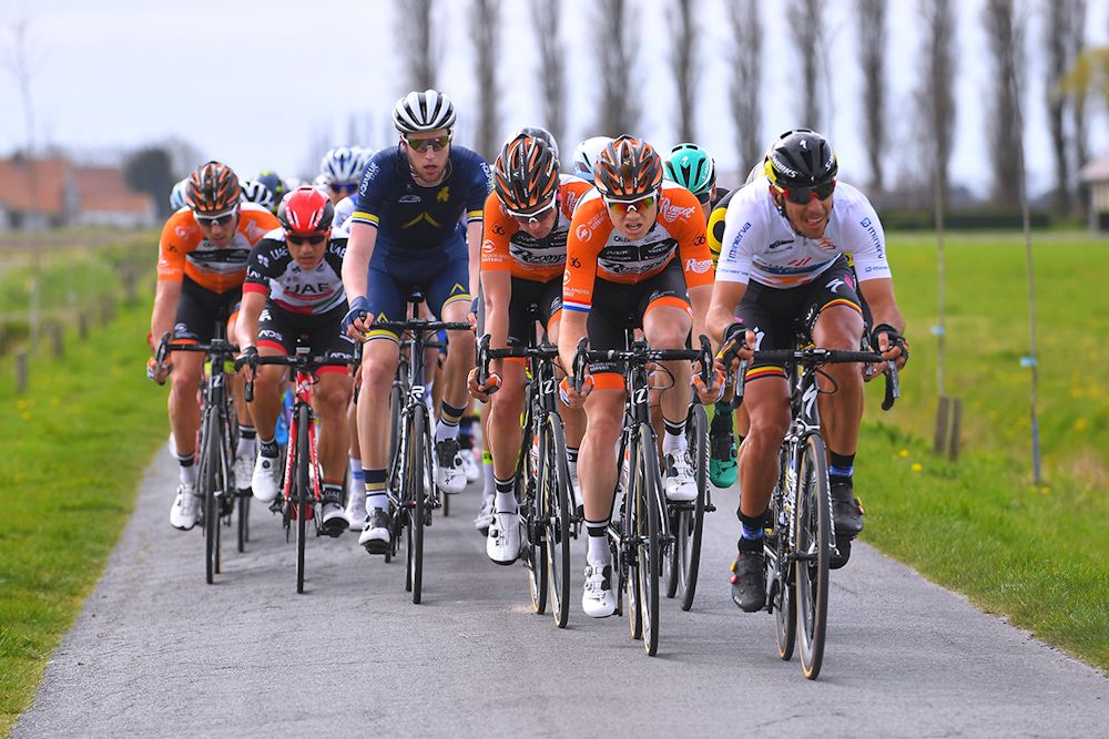 Wearing the leader's jersey, Philippe Gilbert drives the pace in the front group during stage 2 of the Three Days of De Panne