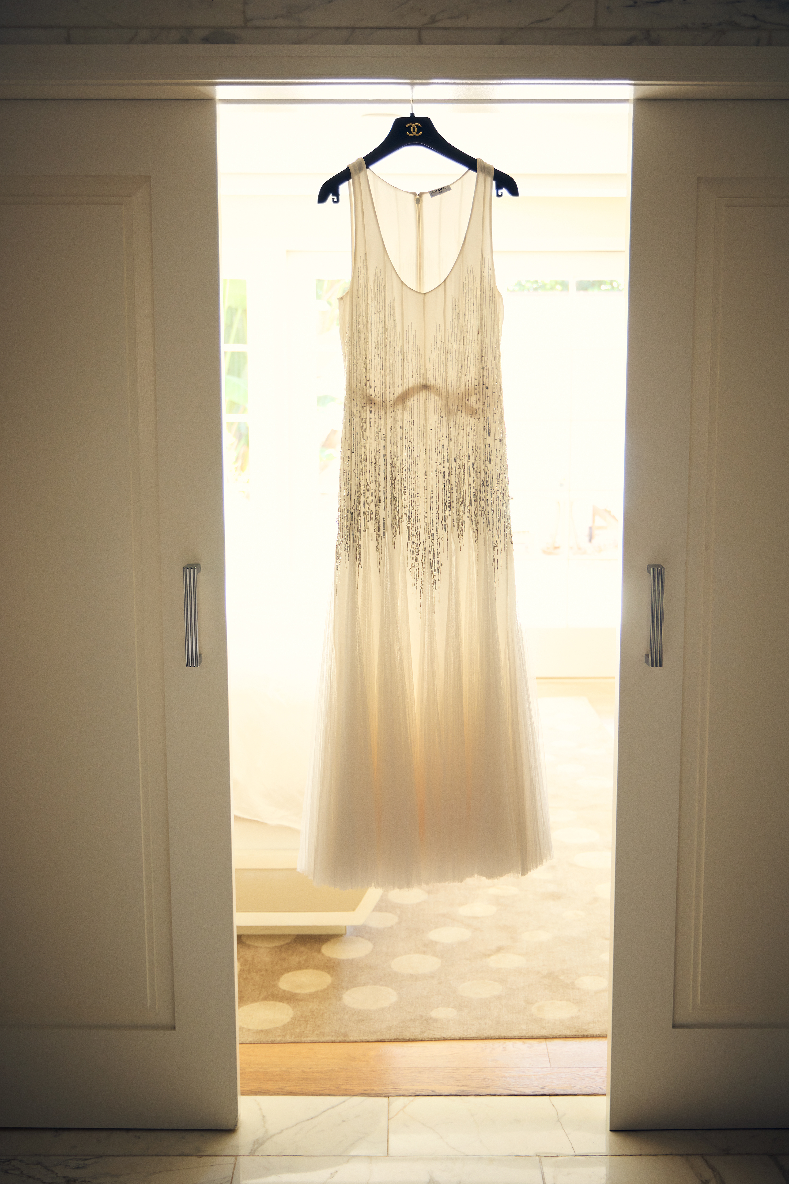 Rose Byrne getting ready for the 2026 Actor Awards in a white Chanel dress