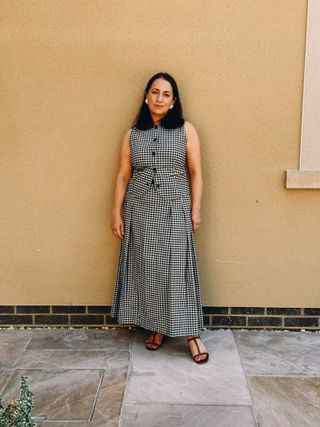 Who What Wear's Editor in Chief, Hannah Almassi wears an Aligne top and skirt set