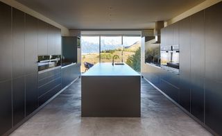 The sleek kitchen features