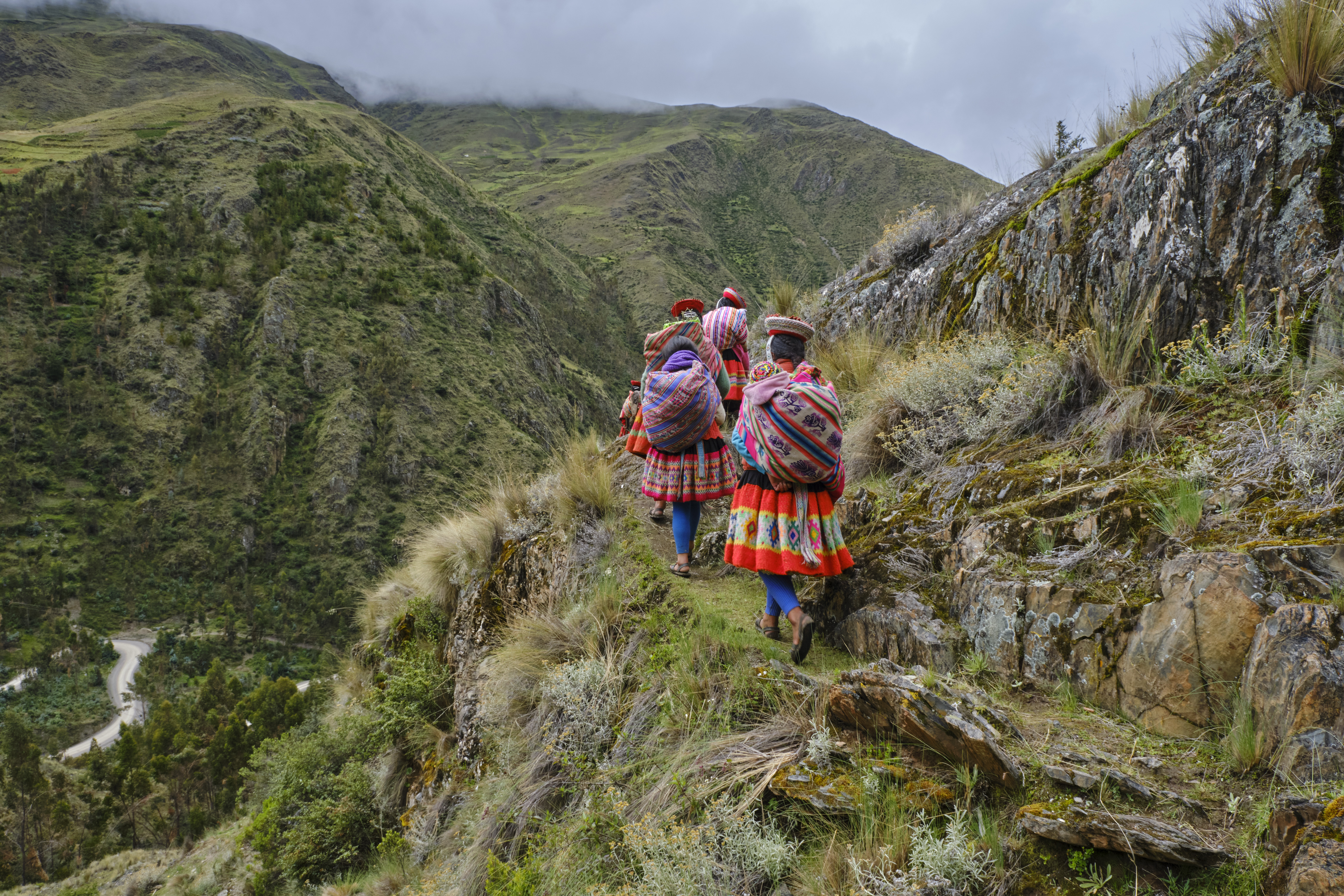 People walking on a mountain path