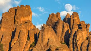 The moon over rock spires in Pinnacles National Park