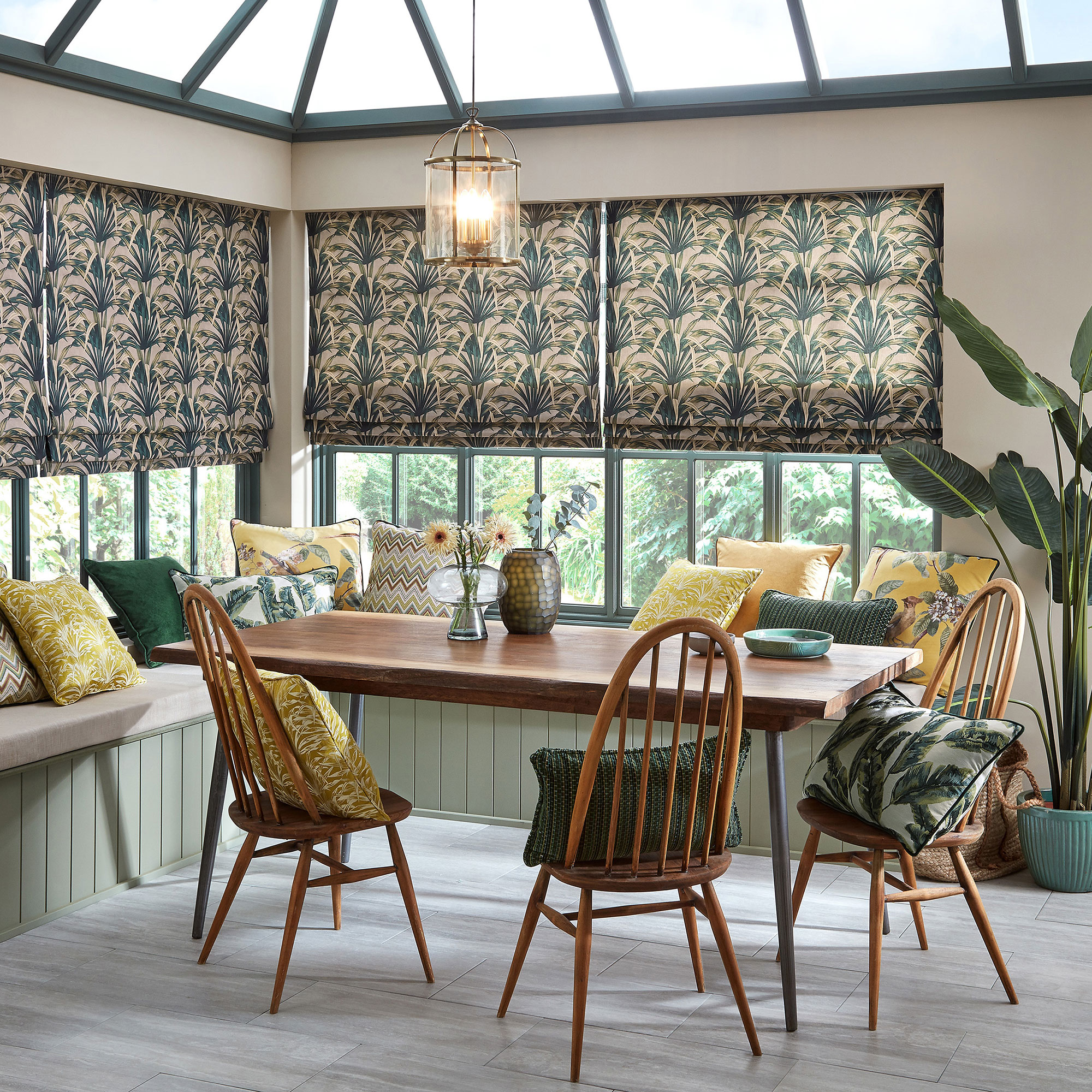 Conservatory space with patterned blinds and banquette seating