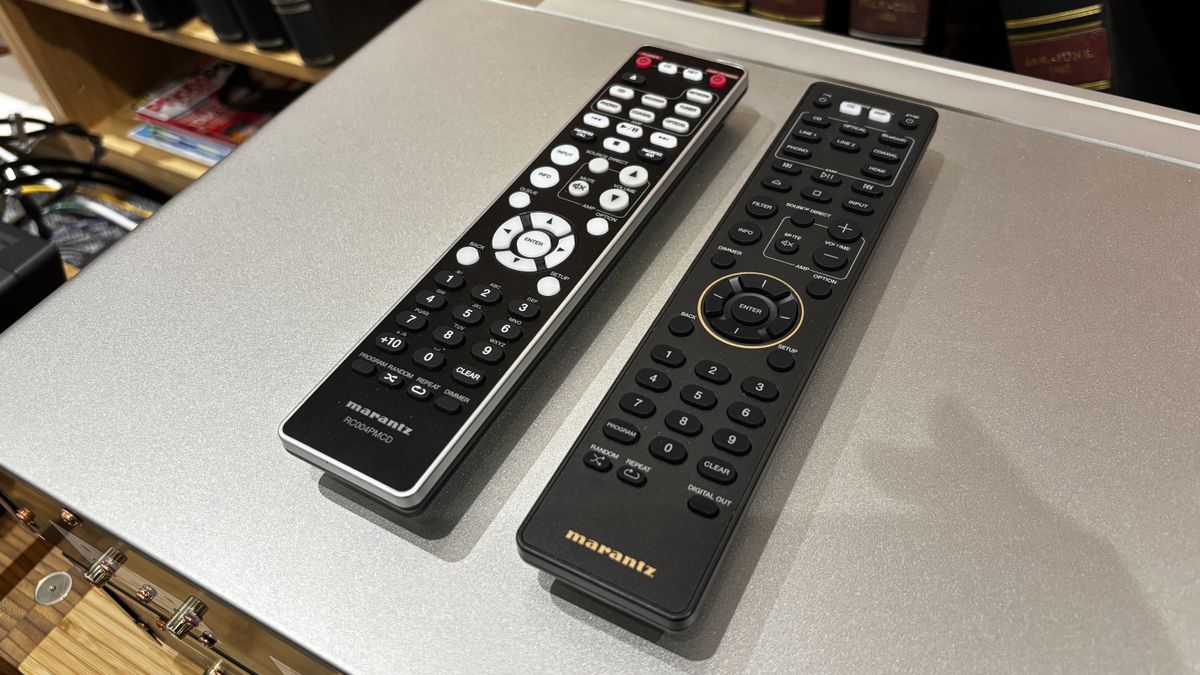 The remote controls for a Marantz CD 70 and CD6007 placed on top of a metal surface