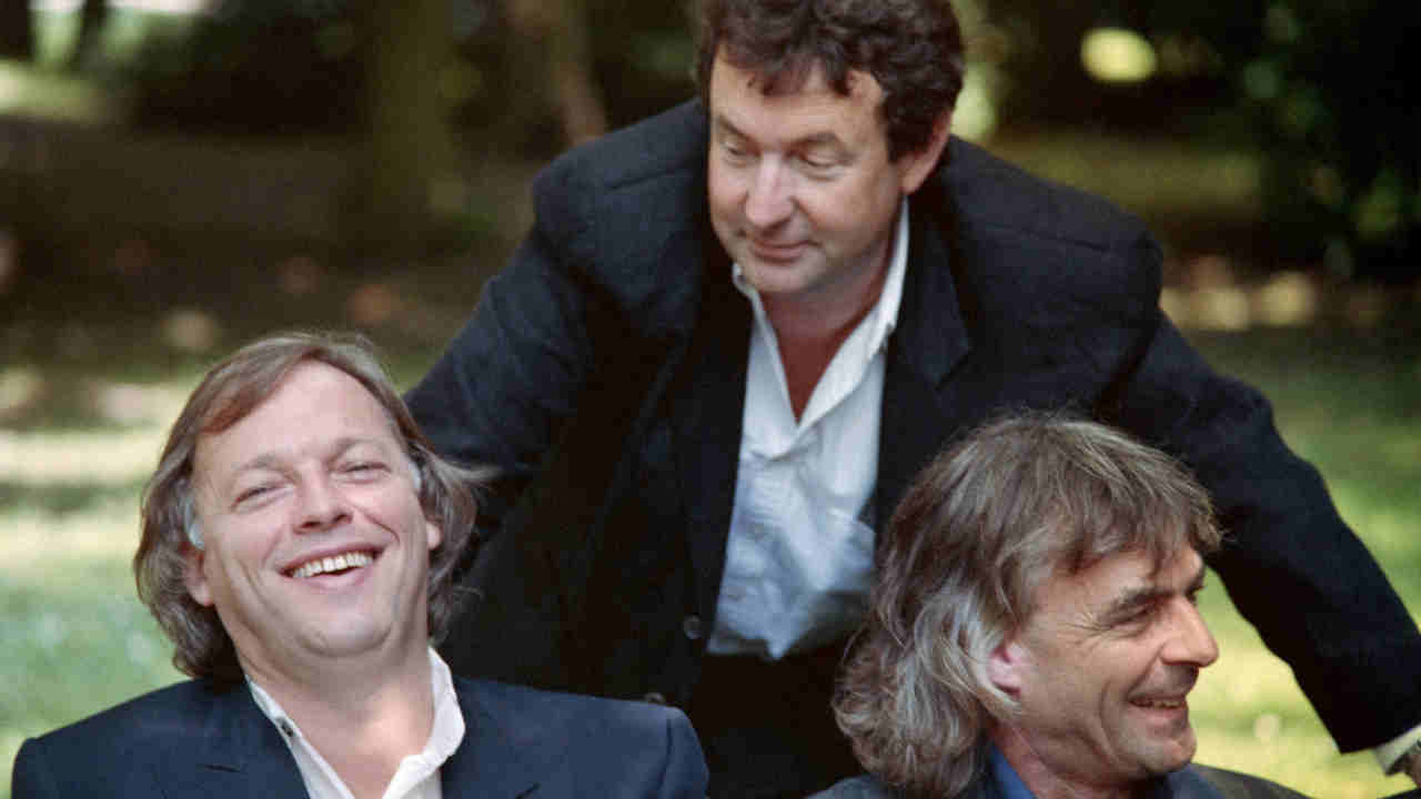 Pink Floyd&amp;rsquo;s David Gilmour, Nick Mason and Rick Wright posing for a photograph in 1988