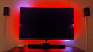 Govee Immersion TV backlights with a red and purple hue