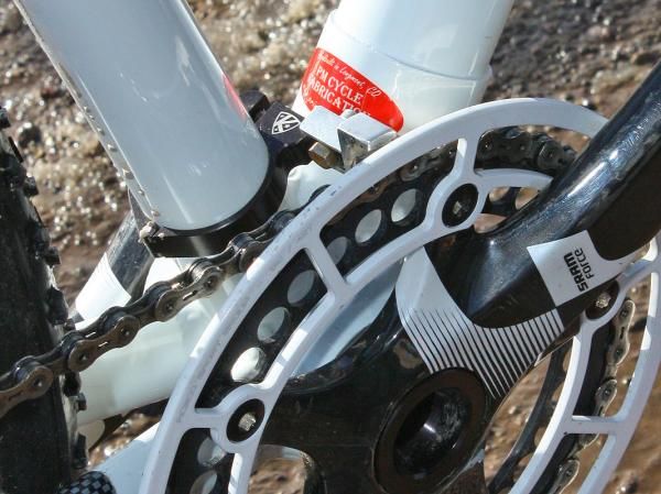 Amy Dombroski's (Schlamm p/b Primus Mootry and Clement) AceCo K-Edge single-ring setup is more properly adjusted but still allows enough vertical movement for the elliptical Rotor Q-Ring.