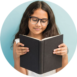 Image of young girl reading a book