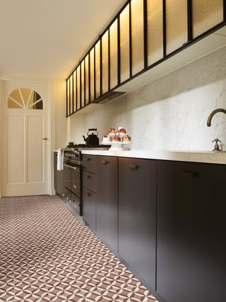 A mid-century design kitchen with bold retro vinyl flooring