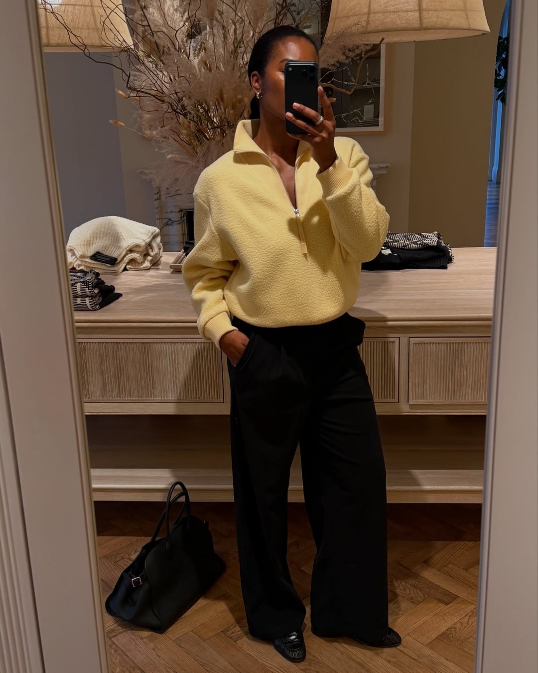 Marilyn NK wears a spring outfit with loafers.