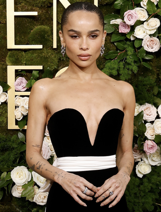 Zoë Kravitz attends the 82nd Annual Golden Globe Awards at The Beverly Hilton on January 05, 2025 in Beverly Hills, California wearing diamond earrings from her engagement ring designer jessica mccormack