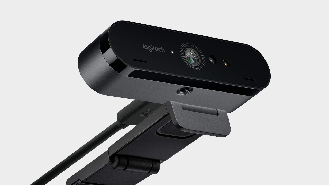 Logitech Brio webcam pictured with stand.