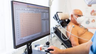 Computer monitor showing cardiac stress test results of a senior male patient in ECG bike. Close-up of computer screen in cardiology clinic.