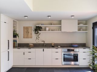 A kitchen with flush mounted lights