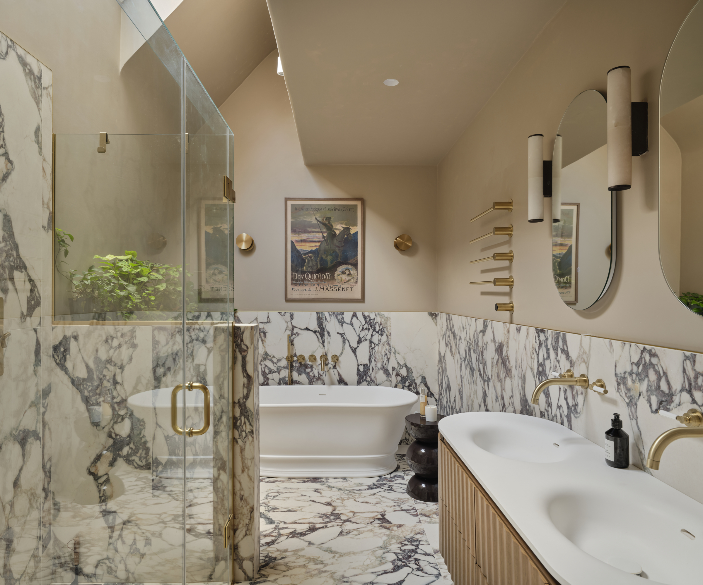 bathroom with veined marble floor and wall tiles, large shower enclosure, double sink with wooden vanity, freestanding bath