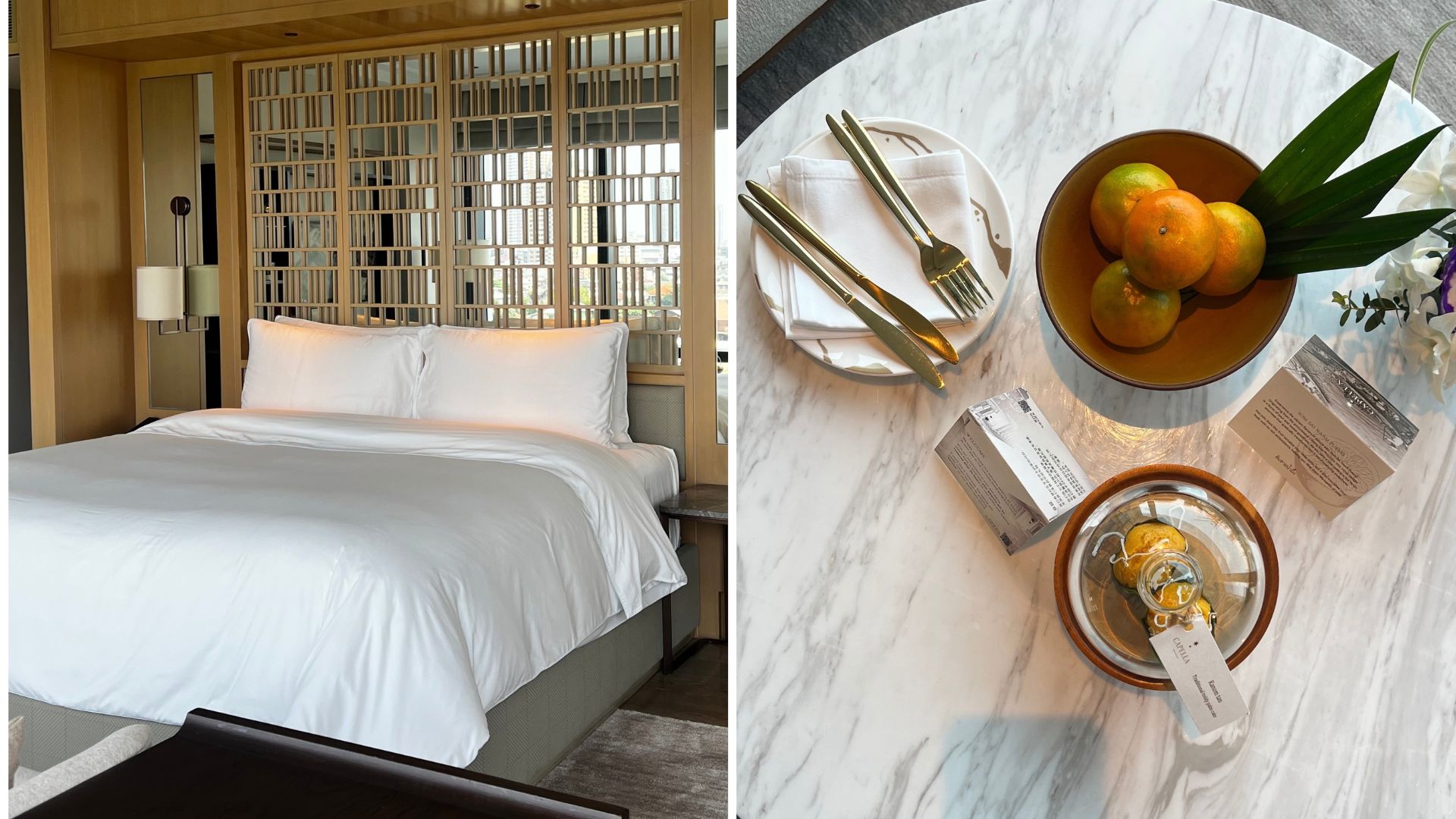 The bed and a marble table showing complimentary fruit and cakes in one of the guest bedrooms at Capella Bangkok