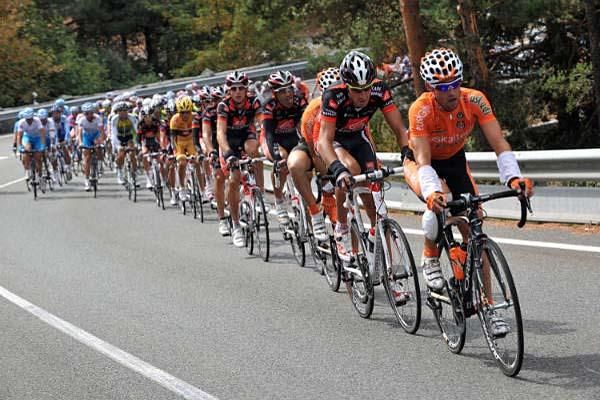 Alejandro Valverde (Caisse d'Epargne) sits safely near the front, but protected behind teammates.