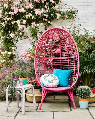 egg chair painted in raspberry ripple paint from Rust-Oleum